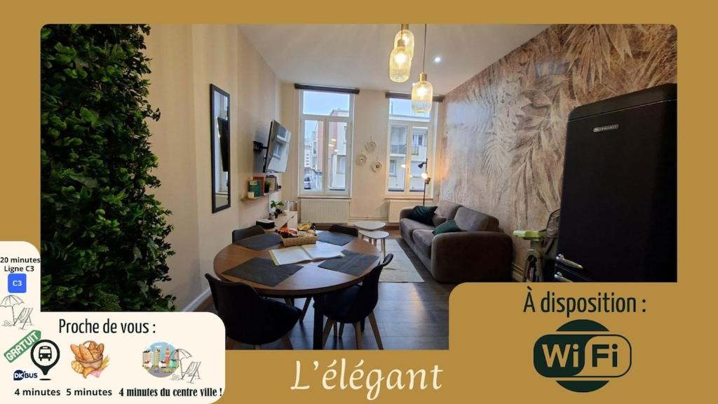 una sala de estar con un sofá y una mesa en L'elegant hyper centre, en Dunkerque