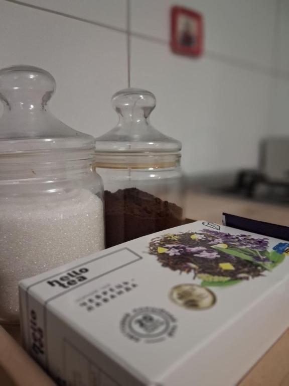 a box of soap and a glass jar of detergent at Книжка in Vinnytsya