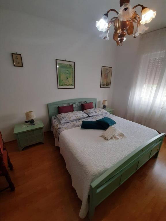 Ένα ή περισσότερα κρεβάτια σε δωμάτιο στο B&B Adamo e Eva