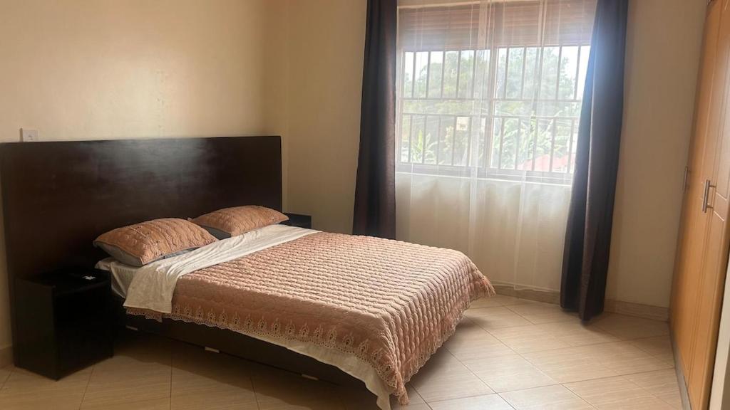 Ένα ή περισσότερα κρεβάτια σε δωμάτιο στο Amuno Haven