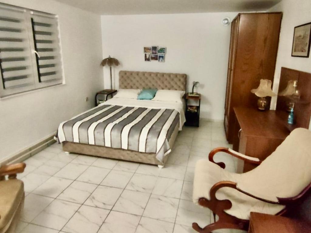 Postel nebo postele na pokoji v ubytování Apartman Oaza