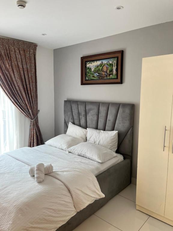 Ένα ή περισσότερα κρεβάτια σε δωμάτιο στο Loxwood House