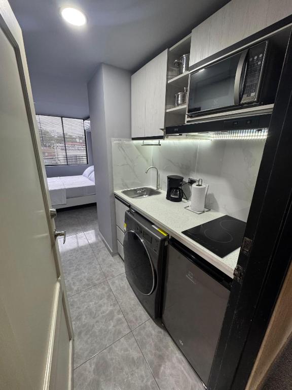 Η κουζίνα ή μικρή κουζίνα στο Apartaestudio