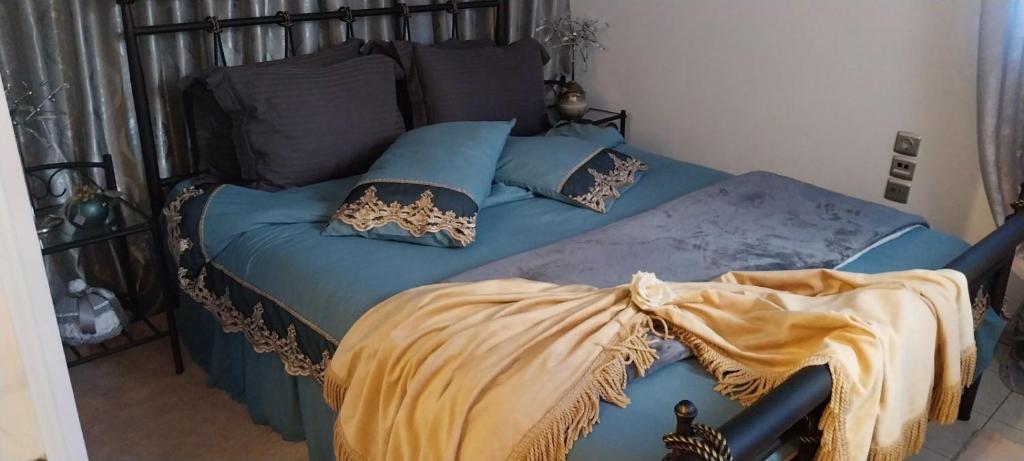 Postel nebo postele na pokoji v ubytování Ariadnis Apartment