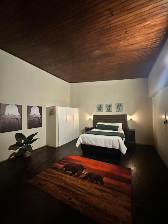 Ένα ή περισσότερα κρεβάτια σε δωμάτιο στο Palm View