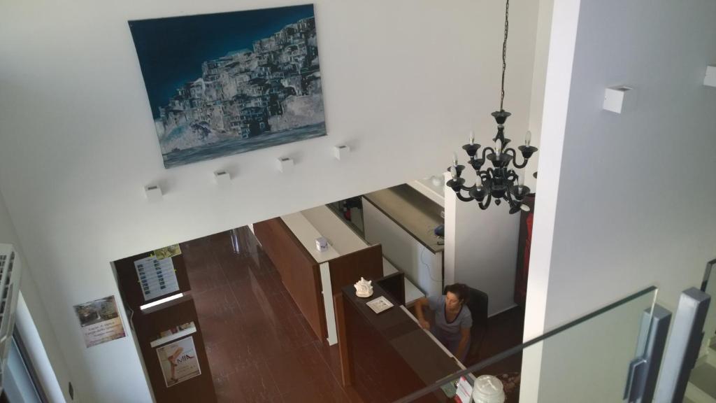 TV a/nebo společenská místnost v ubytování Pansini Hotel Residence
