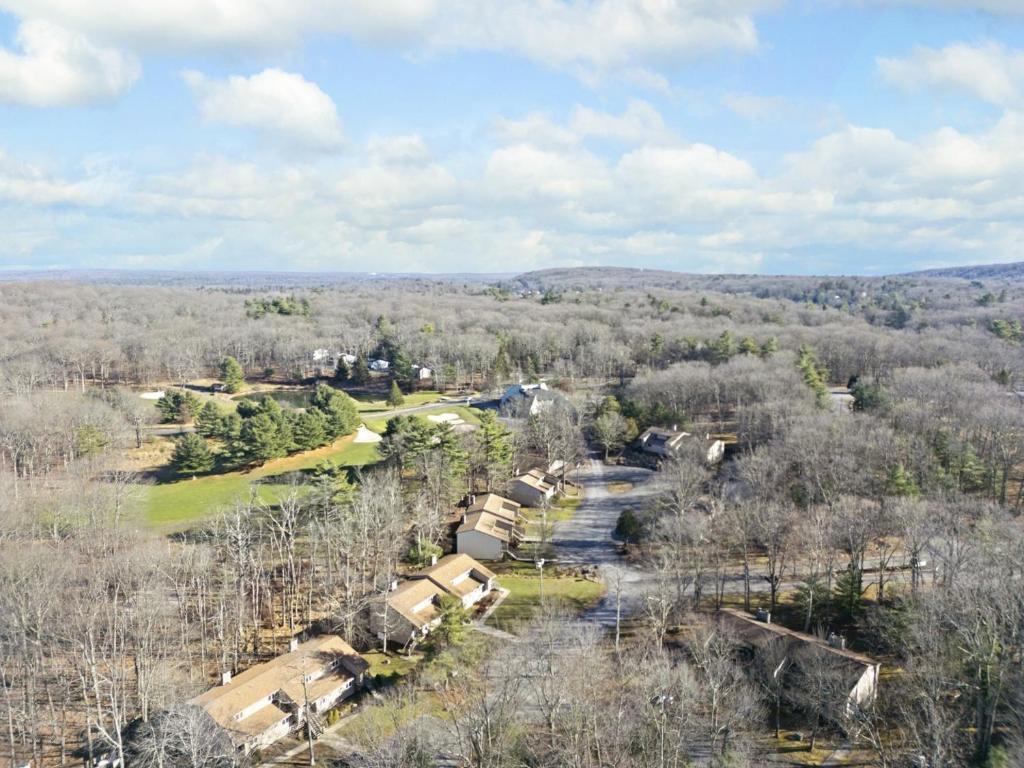 an aerial view of the property with trees at Westwood Villas by Coolvacay in Lake Harmony