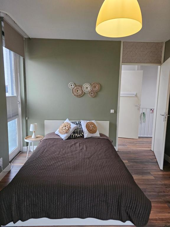 Giường trong phòng chung tại Kopje van Haaglanden