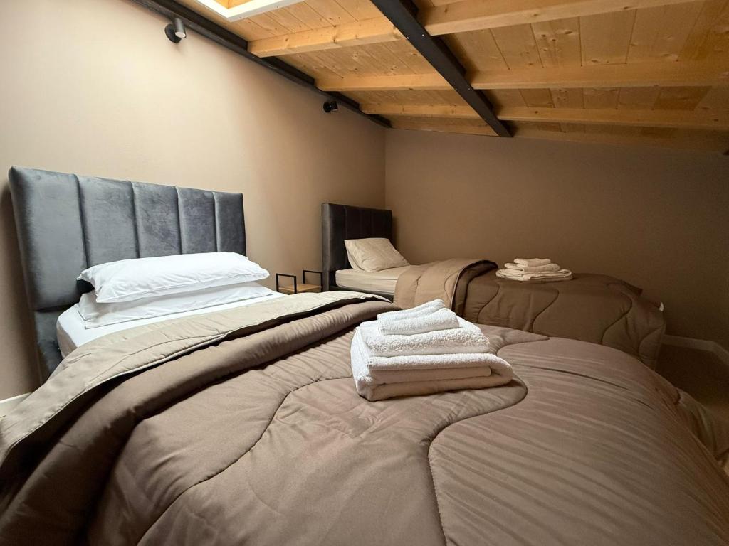 Ένα ή περισσότερα κρεβάτια σε δωμάτιο στο La Casa di Marsy