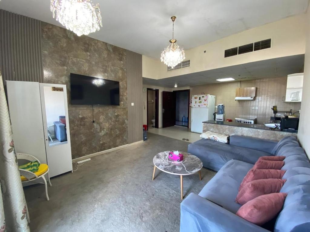 Η κουζίνα ή μικρή κουζίνα στο Lovely apartment in heart of Ajman