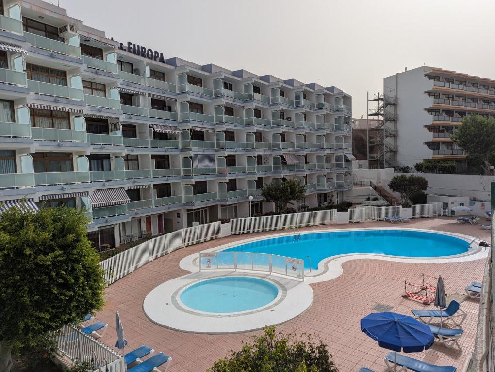 Swimmingpoolen hos eller tæt på Apartamento Studio Anau k&L- Playa - Yumbo