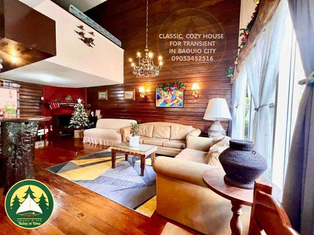 a living room with a couch and a table at Classic, Cozy House for Transient in Baguio City 1 in Baguio