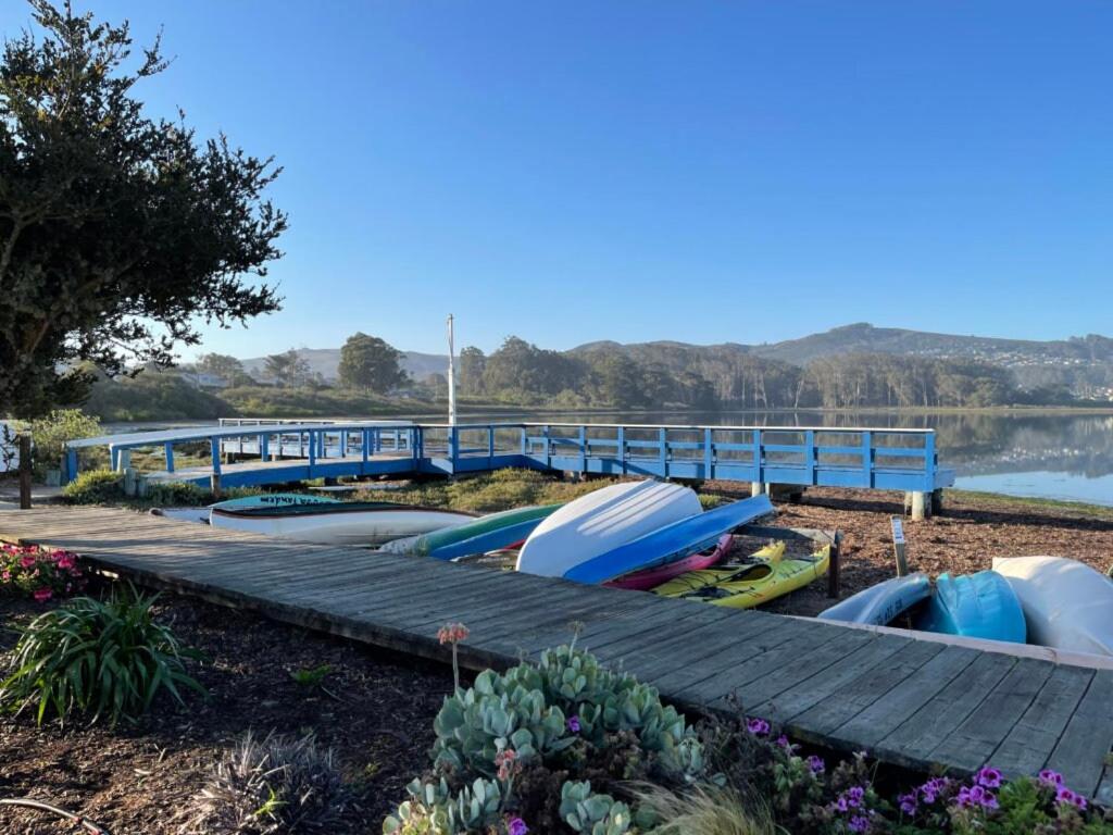 a group of boats parked next to a dock at ZenDen Rv by The Sea in Los Osos in San Luis Obispo