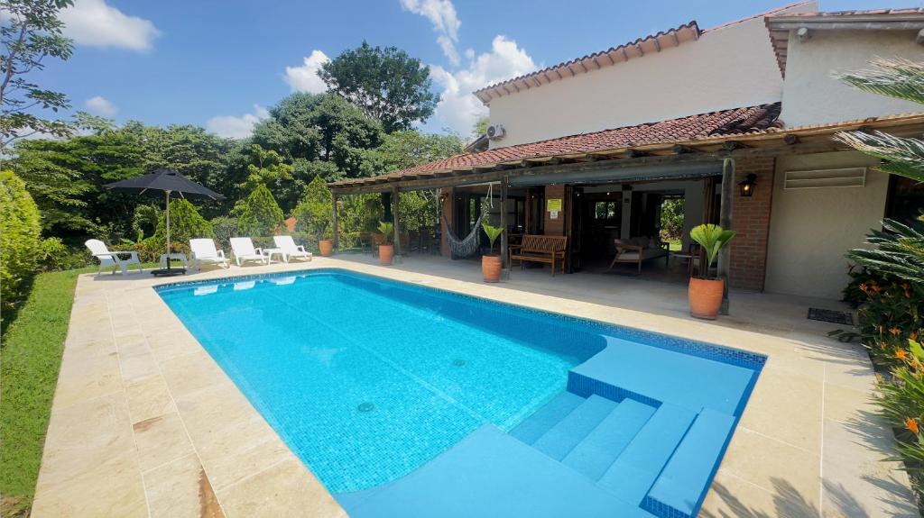 Bazén v ubytování Fincas Panaca JAGUEY 21 Exclusividad, piscina y Jacuzzi nebo v jeho okolí