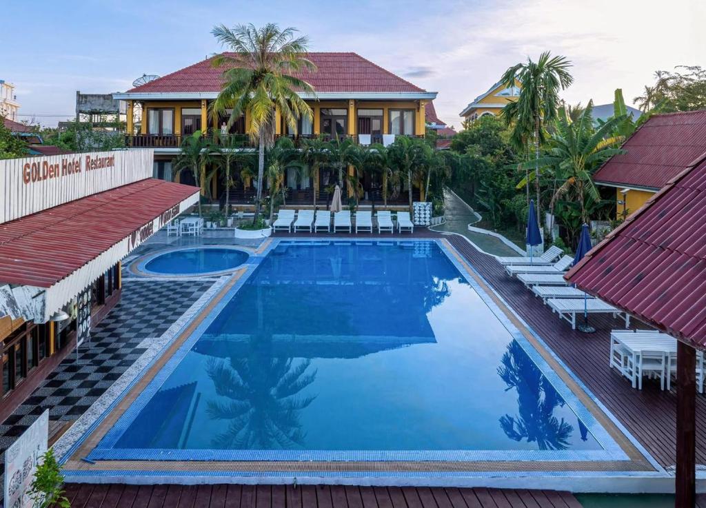 an image of a swimming pool at a resort at golden hotel dondet in Don Det