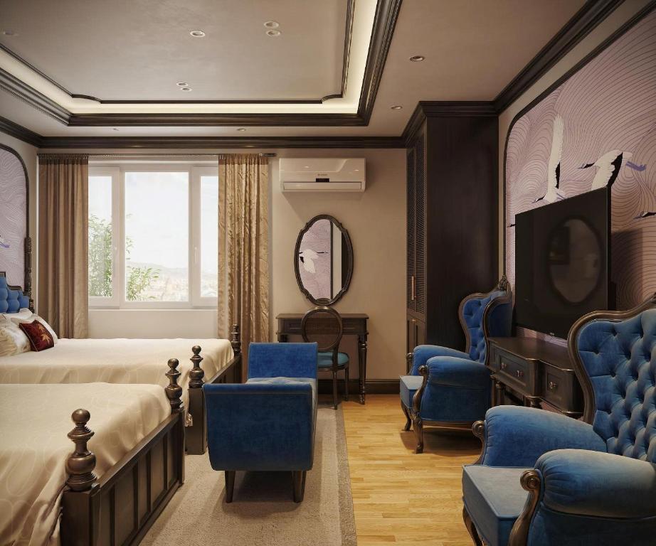 Ένα ή περισσότερα κρεβάτια σε δωμάτιο στο Diamond Hotel Hanoi