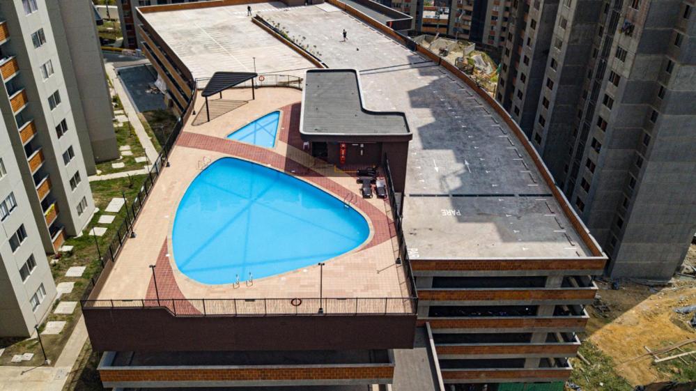 Piscina de la sau aproape de Espectacular Habitacion Privada en Apartamento