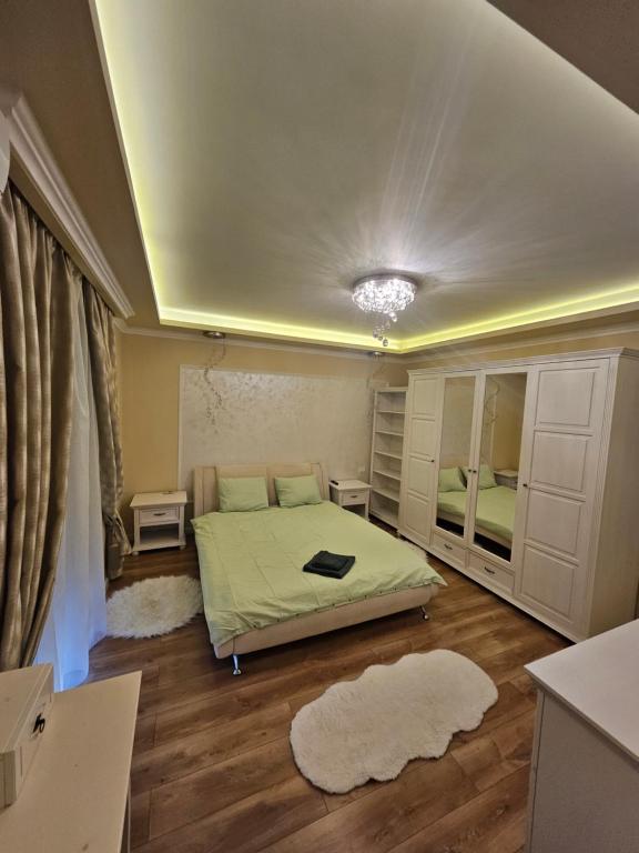 En eller flere senge i et værelse på Amazing Family Delight 2