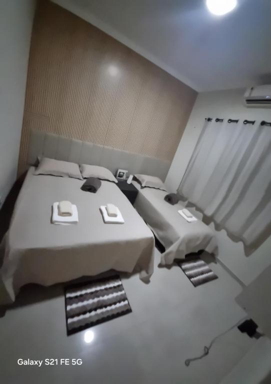 Ένα ή περισσότερα κρεβάτια σε δωμάτιο στο Casa de Maria