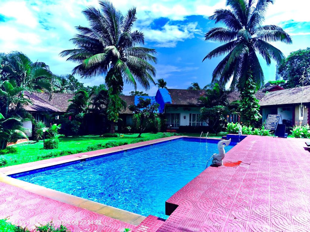 Πισίνα στο ή κοντά στο Sana Villa & Resort Goa