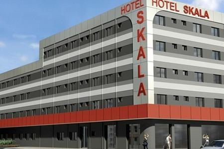 a rendering of a hotel building with a car parked in front at Skala Traveling Hotel in Cuiabá