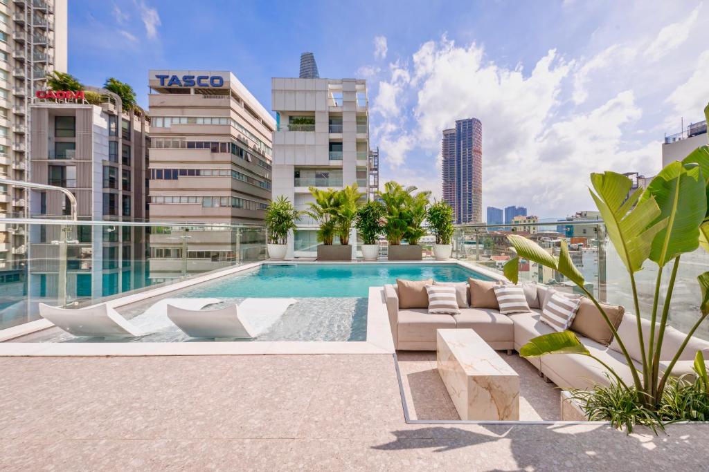 a pool on the roof of a building at IconSphere Hotel in Ho Chi Minh City