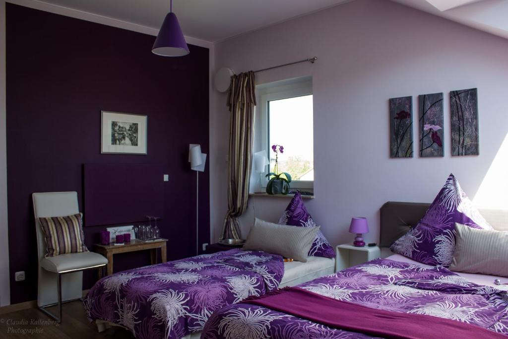 Postel nebo postele na pokoji v ubytování Hotel Haus Kallenberg