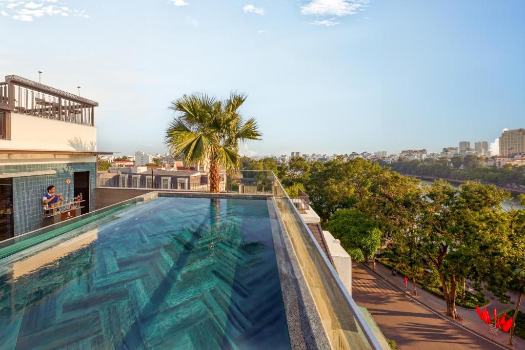 a swimming pool on the roof of a building at La Siesta Premium Lakeside in Hanoi