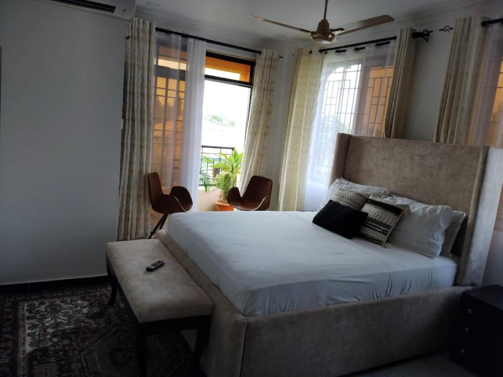 Ένα ή περισσότερα κρεβάτια σε δωμάτιο στο Crystal House