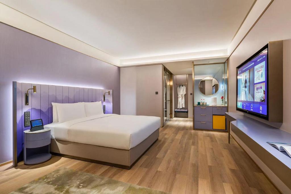 Fotografie z fotogalerie ubytování 郑州东站万象城酒店 v destinaci Xingzhuang