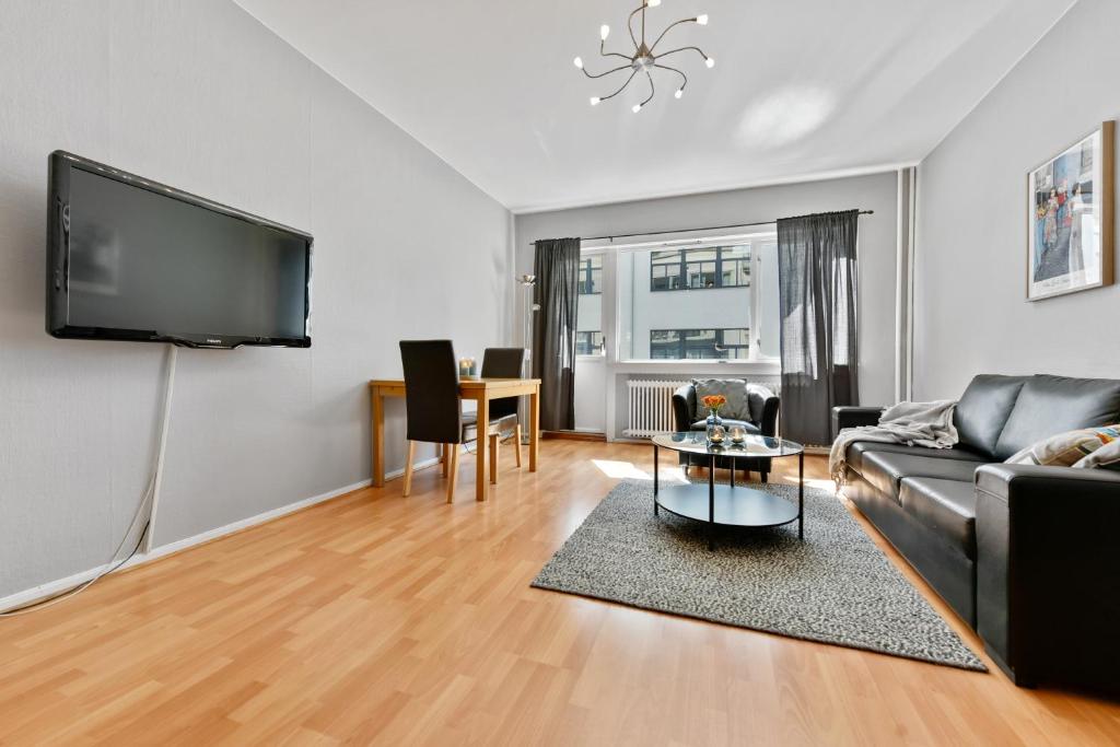 TV a/nebo společenská místnost v ubytování Forenom Serviced Apartments Oslo Rosenborg