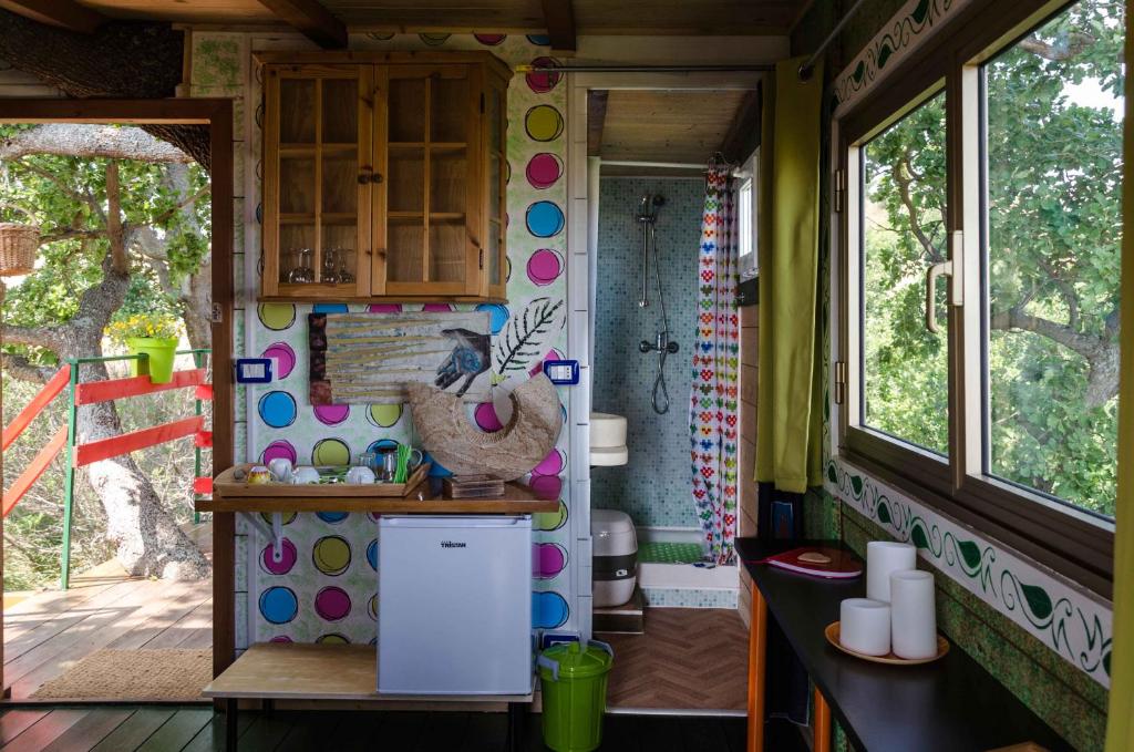 Kuchyň nebo kuchyňský kout v ubytování Casa sull'Albero