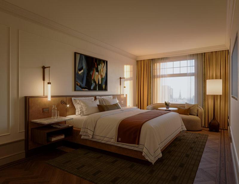 a large bedroom with a large bed and a window at The Huntington Hotel in San Francisco
