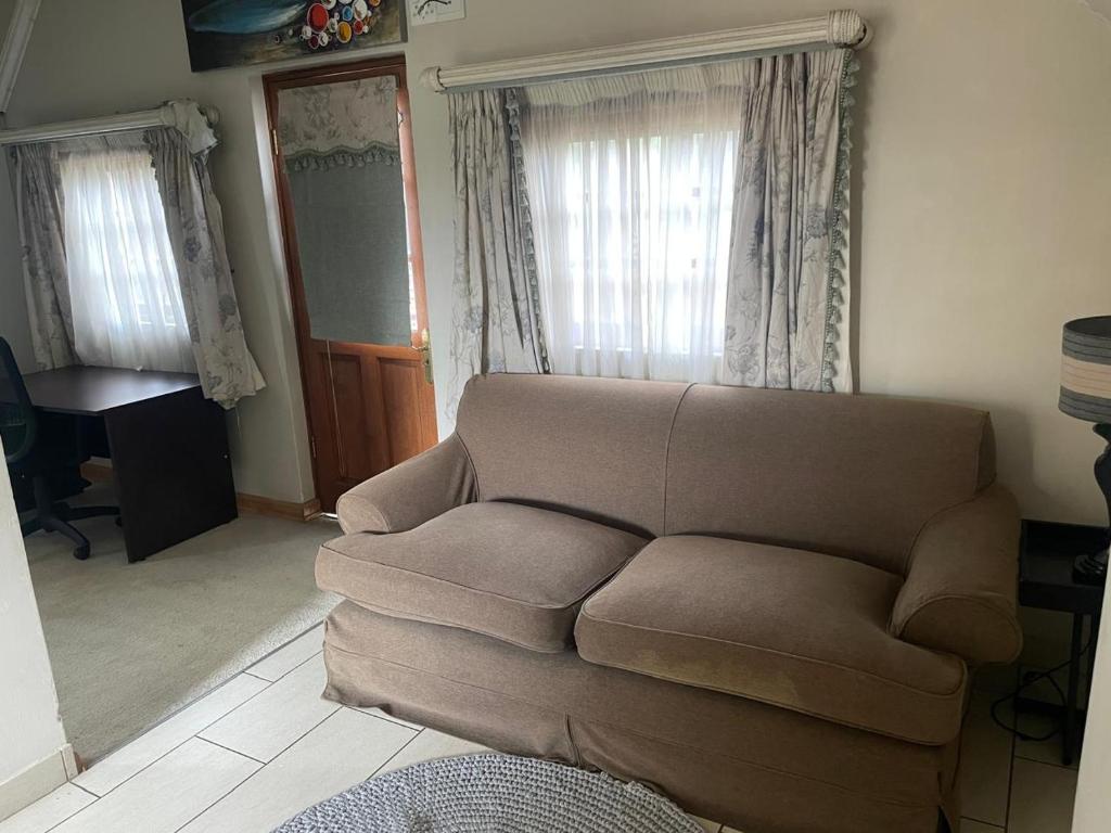 Khu vực ghế ngồi tại Cottage apartment