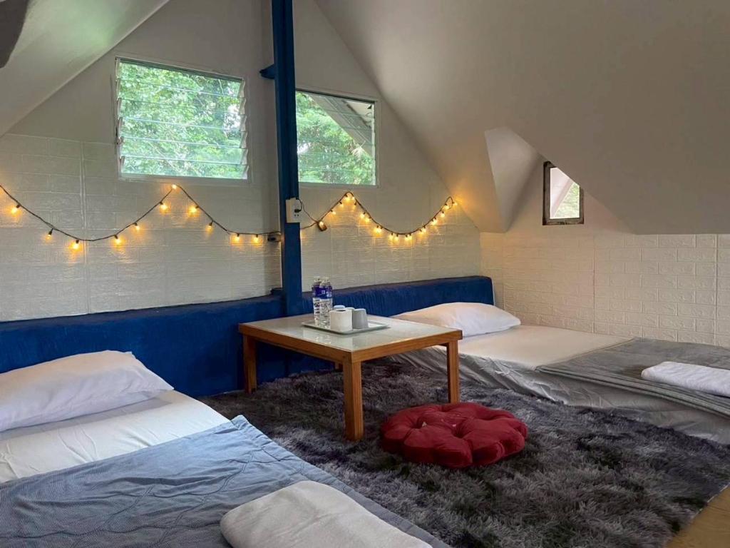 Ένα ή περισσότερα κρεβάτια σε δωμάτιο στο Riverside Khao Yai