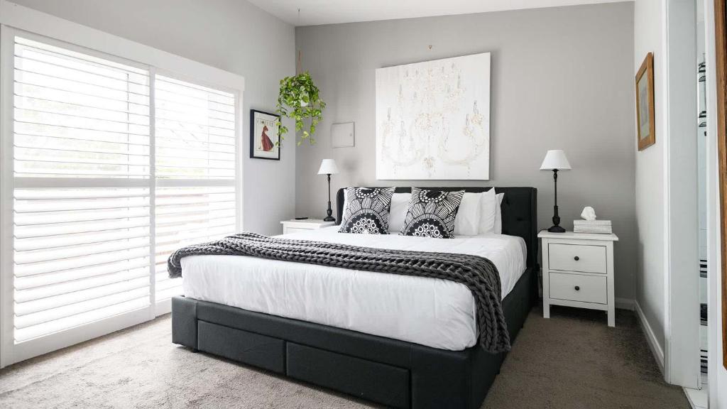 Ένα ή περισσότερα κρεβάτια σε δωμάτιο στο Elsa Hepburn Springs