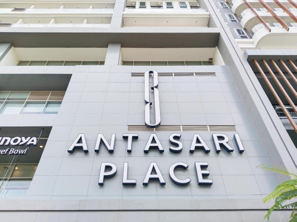 an embassy place sign on a building at 45 Antasari Suite powered by Cocotel in Jakarta