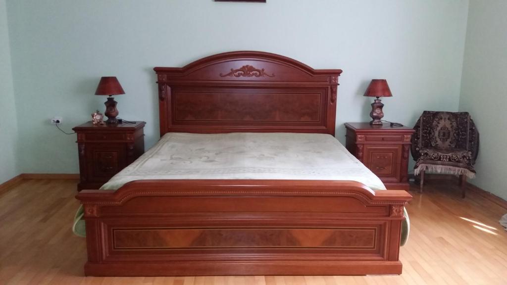 Postel nebo postele na pokoji v ubytování Guest House kartvelishvili