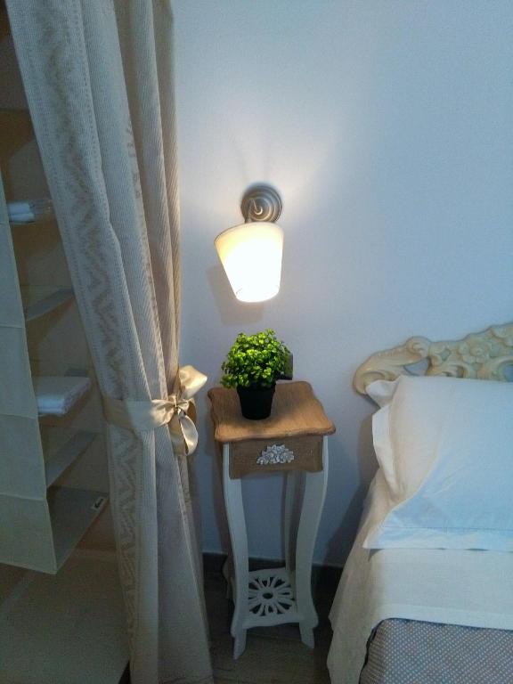 Łóżko lub łóżka w pokoju w obiekcie La Casetta Holiday Home