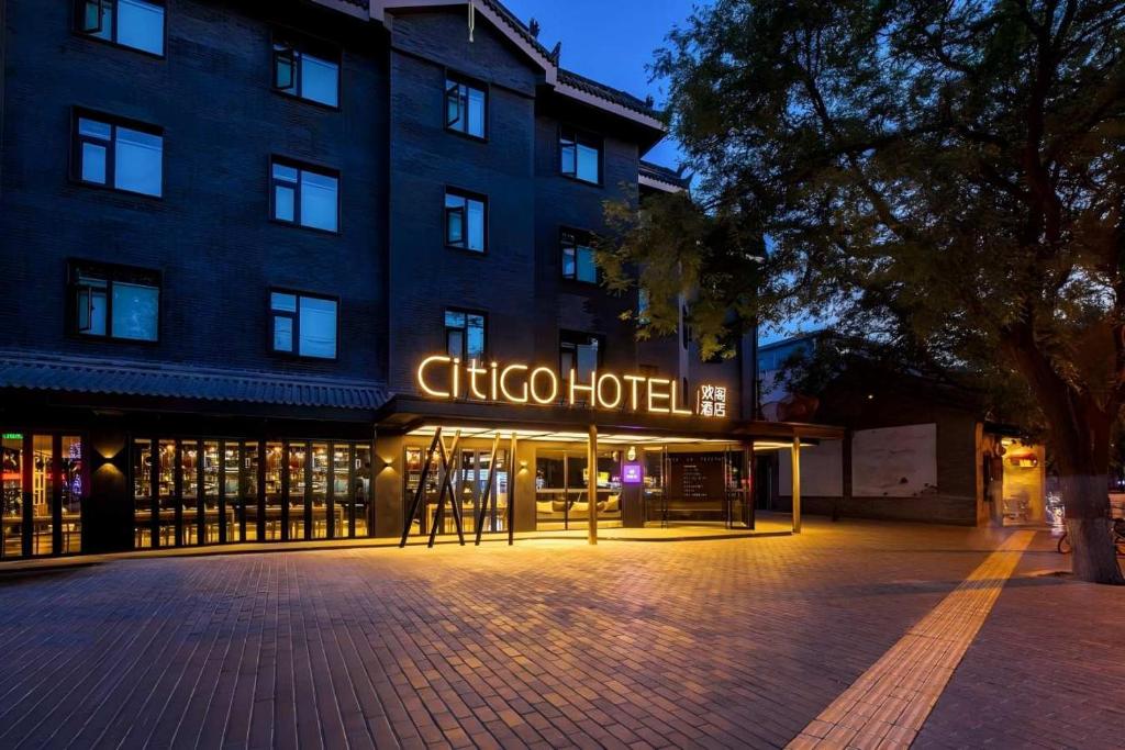 a building with a sign that reads cuoco hotel at CitiGO Hotel, South Gate of Xi'an Bell Tower in Xi'an