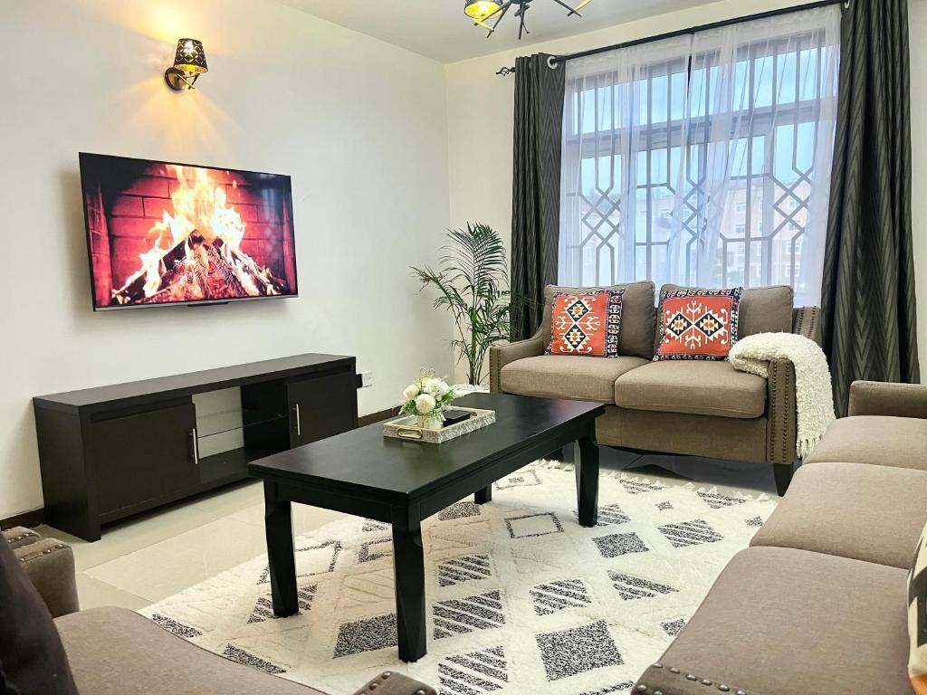 Posezení v ubytování Milimani Executive Suites With Pool GYM Secure Parking