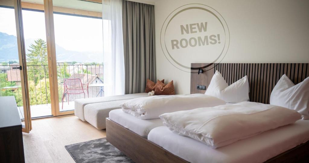 Postel nebo postele na pokoji v ubytování Schäfle Feldkirch-Altenstadt