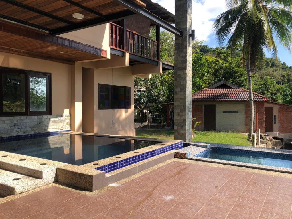 Πισίνα στο ή κοντά στο The Pura Rimba Residences Langkawi