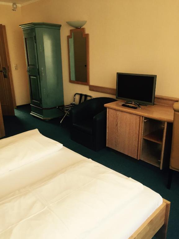 TV a/nebo společenská místnost v ubytování Hotel Gerber