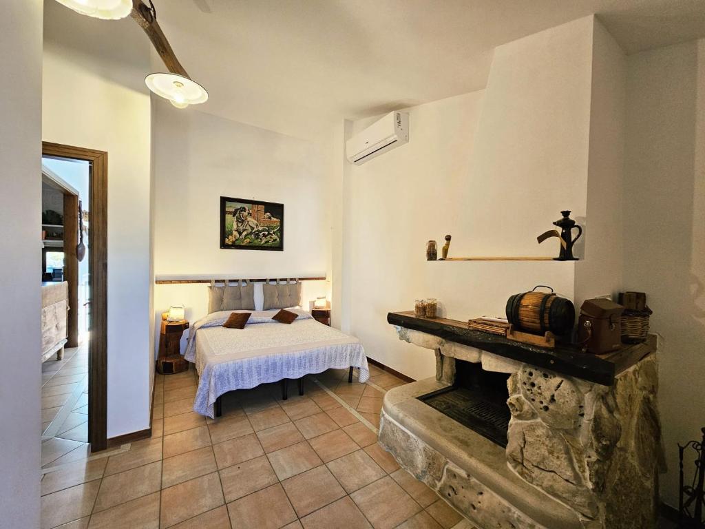 Postel nebo postele na pokoji v ubytování Masseria la Fiorita