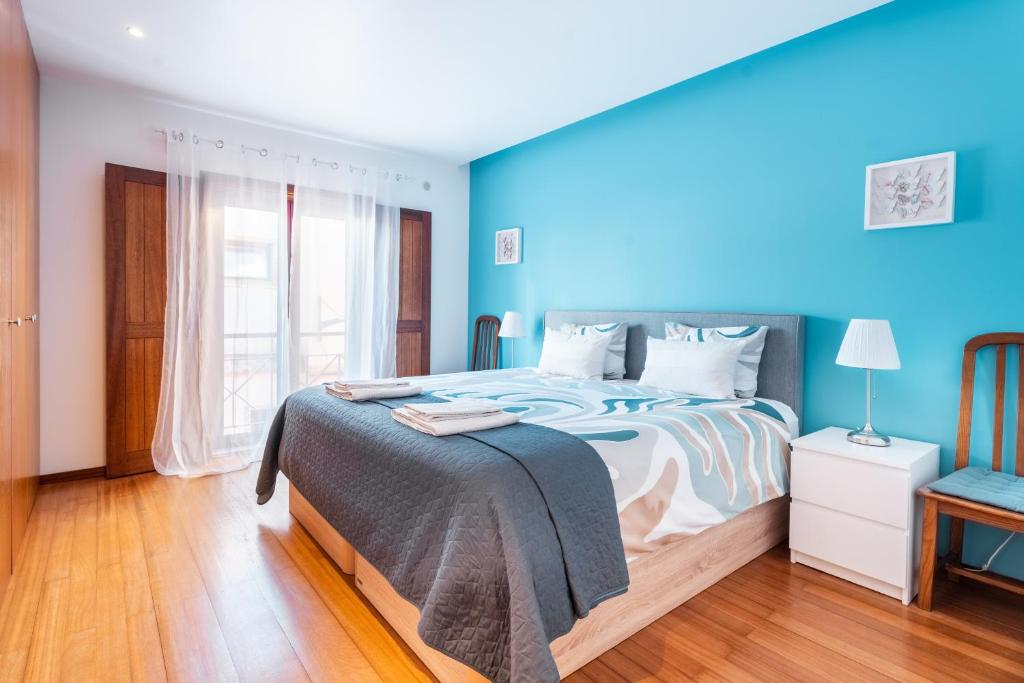 Ένα ή περισσότερα κρεβάτια σε δωμάτιο στο Casa da Bélgica