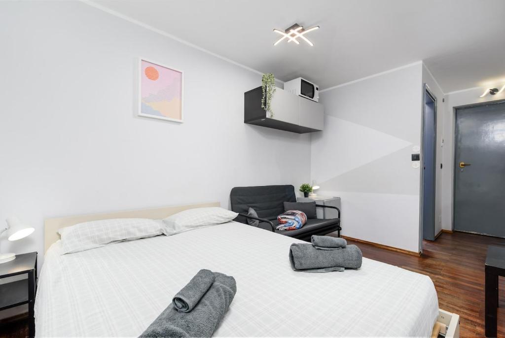 Postel nebo postele na pokoji v ubytování Sestriere - 200 mt dalle piste da sci - Monolocale