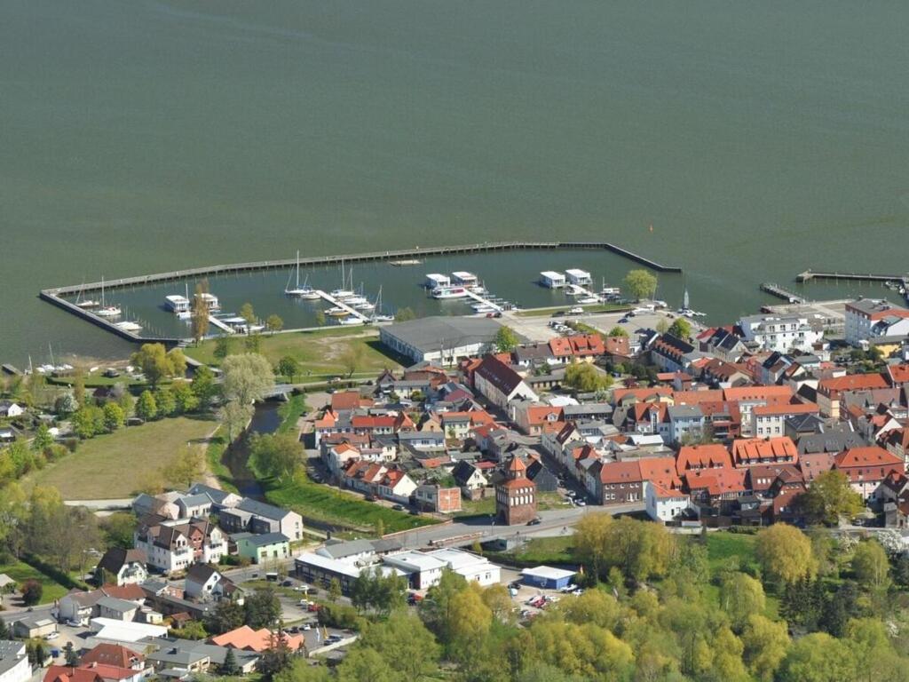 an aerial view of a town with a marina and boats at Wellenreiter Comfortable holiday residence in Ribnitz-Damgarten