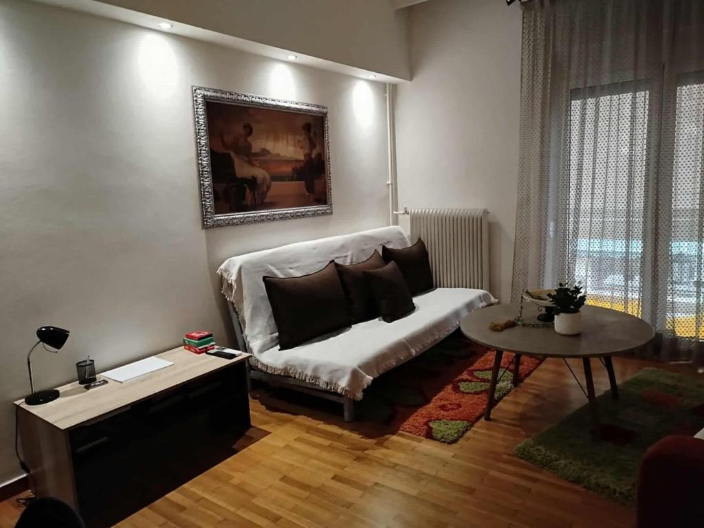 En eller flere senge i et værelse på Central glow apartment