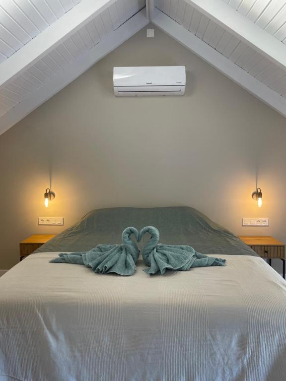 En eller flere senge i et værelse på Casita Tierra De Suerte